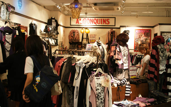 Algonquins punk t-shirts, black and white striped scarves, pink shirts, Hot Topic store interior. Japanese goth punk brand at Laforet Harajuku.