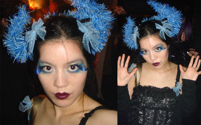 Cyber gothic club outfit at Tokyo Dark Castle. La Carmina in blue Anna Sui fake eyelashes, dark purple MAC lipstick, bows and horns on head from Daiso Japan dollar store.