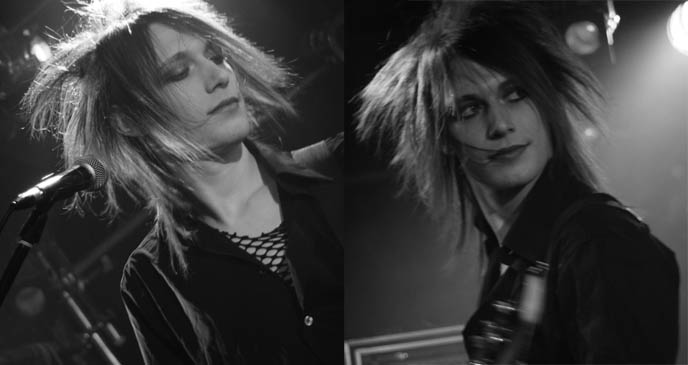 Androgynous musician, guitarist 1970s glam rock concert image. Japanese visual kei rock band Laverite. Girly boy rockstar.