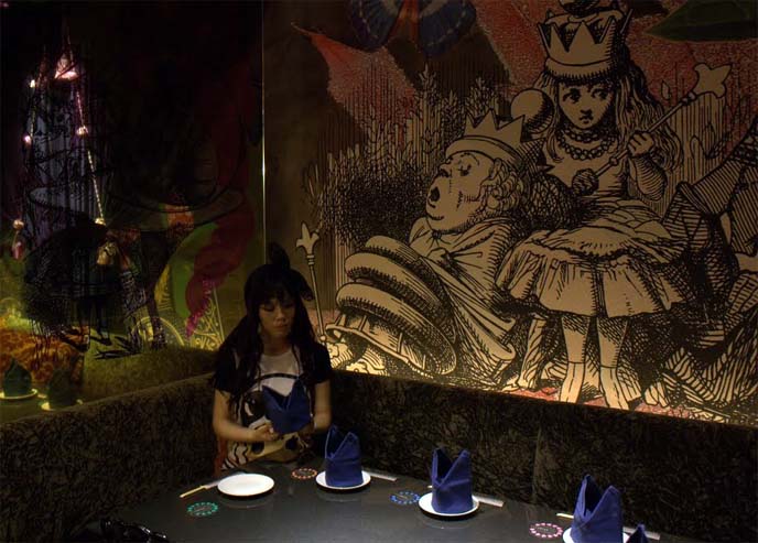 WORLD'S WEIRDEST RESTAURANTS, FOOD NETWORK: ALICE IN WONDERLAND CAFE, SHINJUKU TOKYO JAPAN. GOTH LOLITAS. bob blumer, tv host, travel channel, glutton for punishment, alice theme restaurant, alice wonderland restaurant, crazy japan theme cafes, maid cafes, tv hosting, fixing, japan production arrangers 