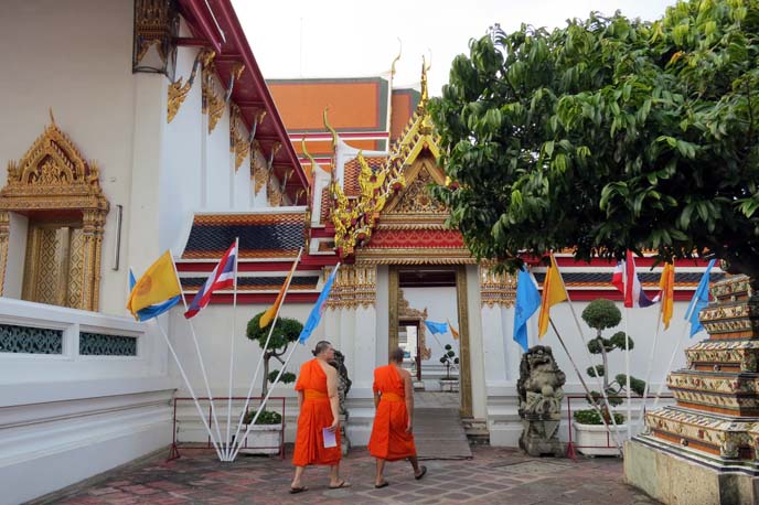 orange robe monks in temple