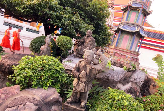 bangkok temple statues, monks in robes