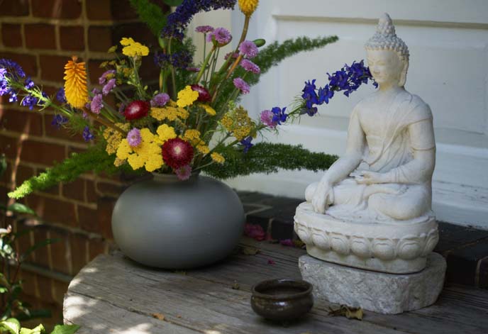 buddhist altar, flowers statue