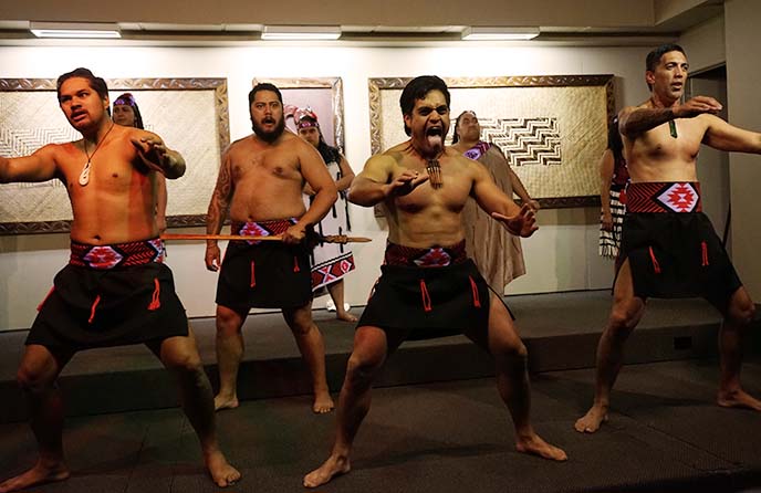 haka dance, new zealand tongue out