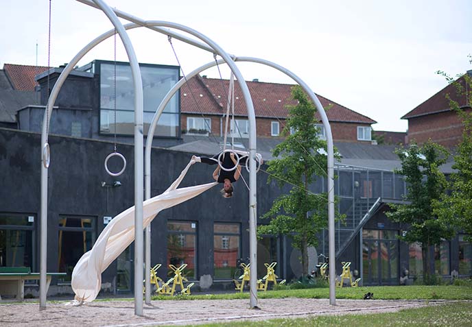 acrobat on rings, silks