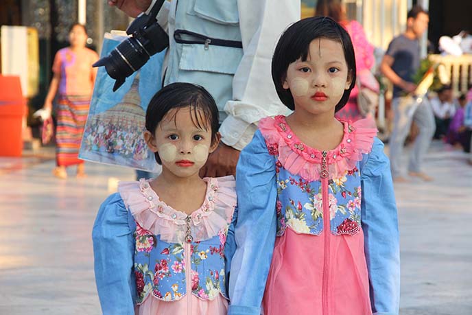 burmese children wearing thanaka face paint