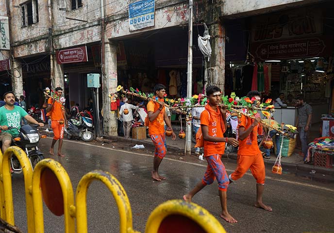 indian pilgrims wearing orange