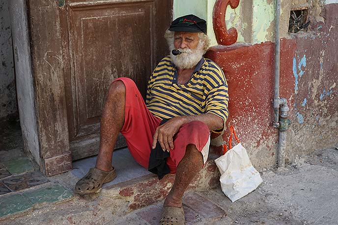 cuban man smoking pipe