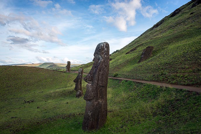 green hills easter island statues