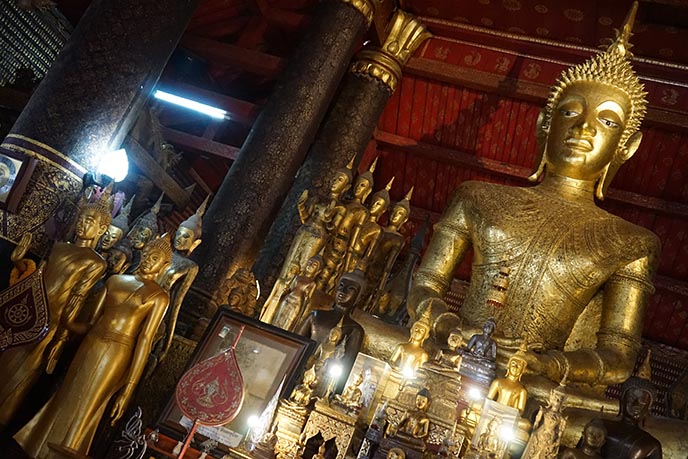 gold buddha statue wat mai laos