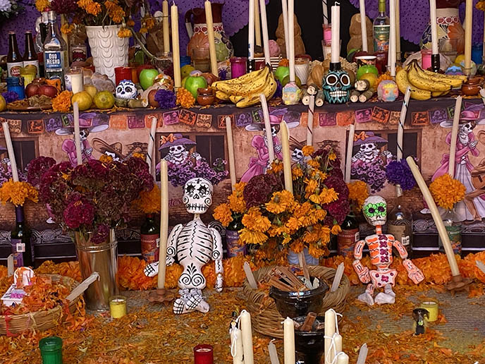 altar day of dead marigold flowers skeleton offerings