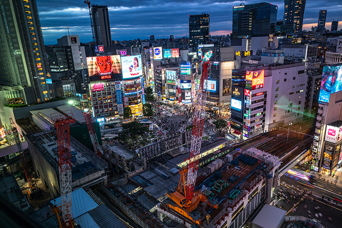 shibuya neon signs buildings billboards view city skyscrapers