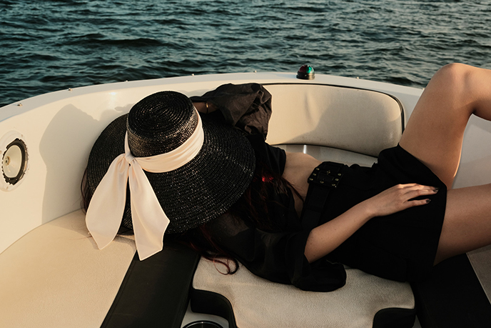 sailing on speedboat vancouver bc mirabel hat eugenia kim millinery hats