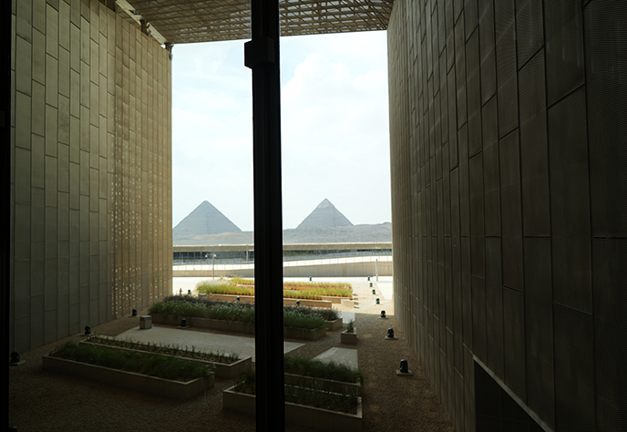 view of pyramids window grand egyptian museum
